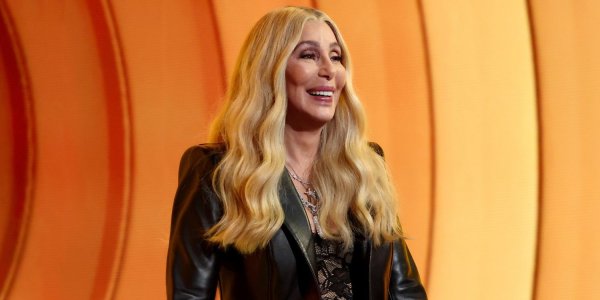 Cher Returns to the Grammys After 18 Years in a Shredded Leather Dress That Looks Ready to Unravel