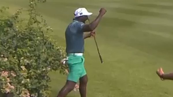 Watch Man Utd legend hole incredible golf shot from behind bushes in celeb clash