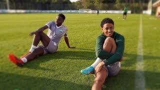 Jonathan Sahr Morsay and Kamil A. Conteh speaking after Friday's training session.