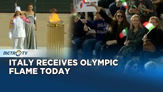 Olympic Flame Handed to Italy for Milan Cortina 2026