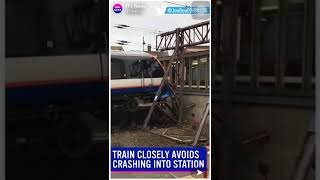 London overground train narrowly avoids CRASH into station