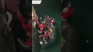 MOMENT migrants were rescued from sinking boat in English Channel; four people died