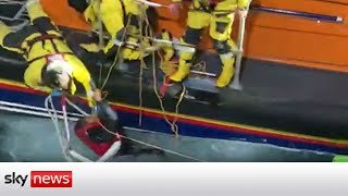 British fishermen saved dozens 'screaming for help' from sinking boat