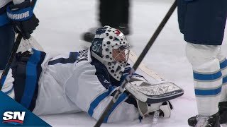 Jets' Connor Hellebuyck Makes Incredible Save On Blackhawks' Connor Bedard