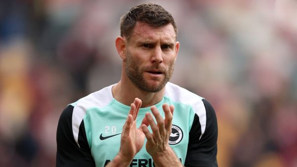 Gareth Barry reacts to James Milner breaking Premier League appearance record