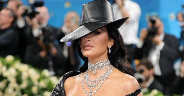 Kim Kardashian Is the New Age Showgirl in Bold Bodysuit for Movie Shoot