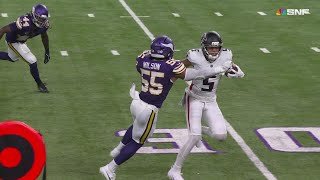 Eric Wilson punches out the ball for a BIG Vikings' turnover