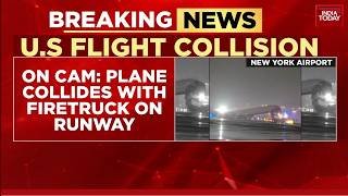 Air Canada Plane Collides With Firetruck On Runway At New York's LaGuardia Airport