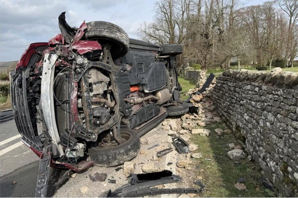 Dramatic picture shows car on its side after crash near Carnforth