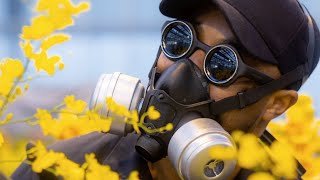 Meet the masked artist who conjured a concrete jungle of 20,000 orchids