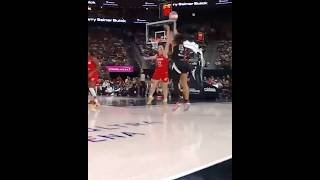 Aaliyah Nye hits a three point shot in Caitlin Clark’s face