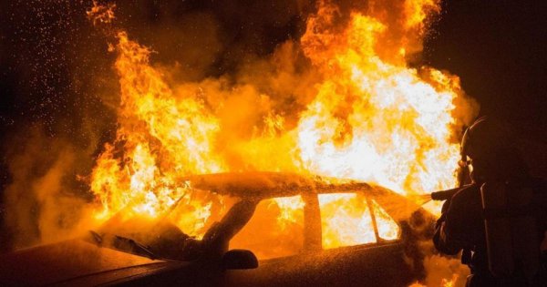 Fire crews race to scene of TORCHED car outside home in residential area