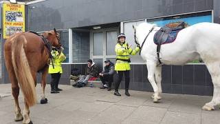 Blackpool The weather has changed again walking though the town to  beach. the shopping area  busy