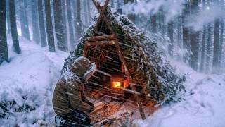 Surviving the SNOWSTORM by building a Bushcraft Shelter | Extreme Winter Survival