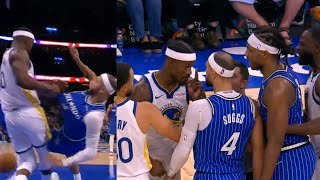 Jimmy Butler gets into it with Jalen Suggs and WCJ after throwing Suggs to ground